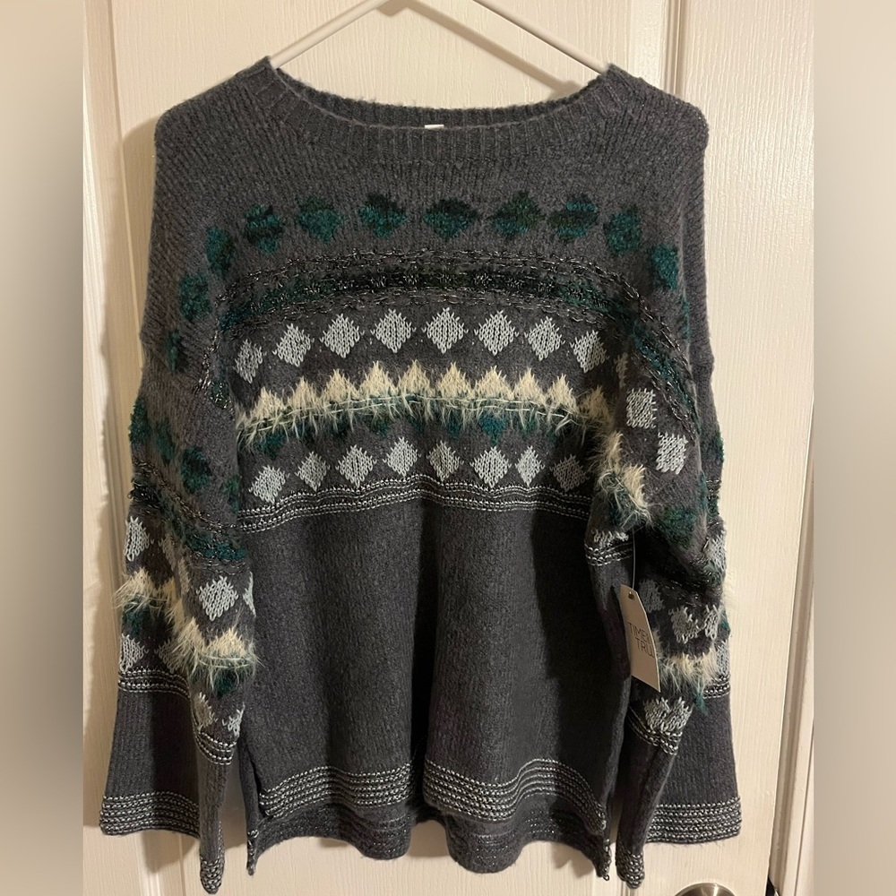 Time and True
Size small (4-6)
Gray with green, light blue, and white details